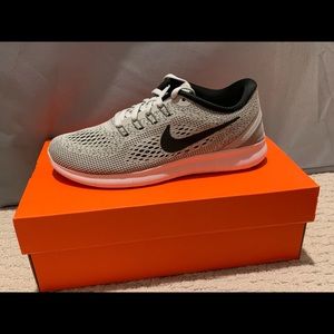 Gray Nike training shoes